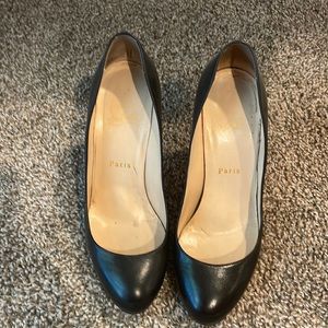 Christian Louboutins black heels